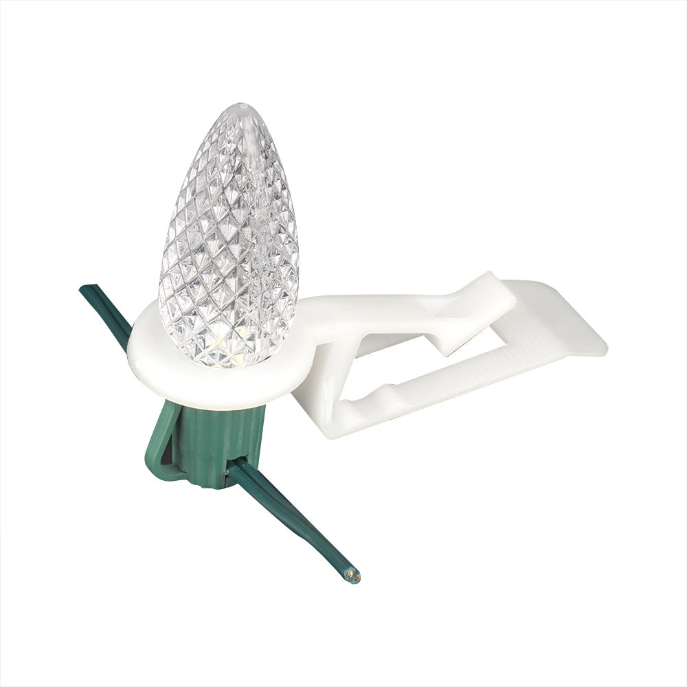 Tuff Clip C9 Wedge Clip mounted on a C9 bulb with left-facing orientation for professional roofline lighting displays.