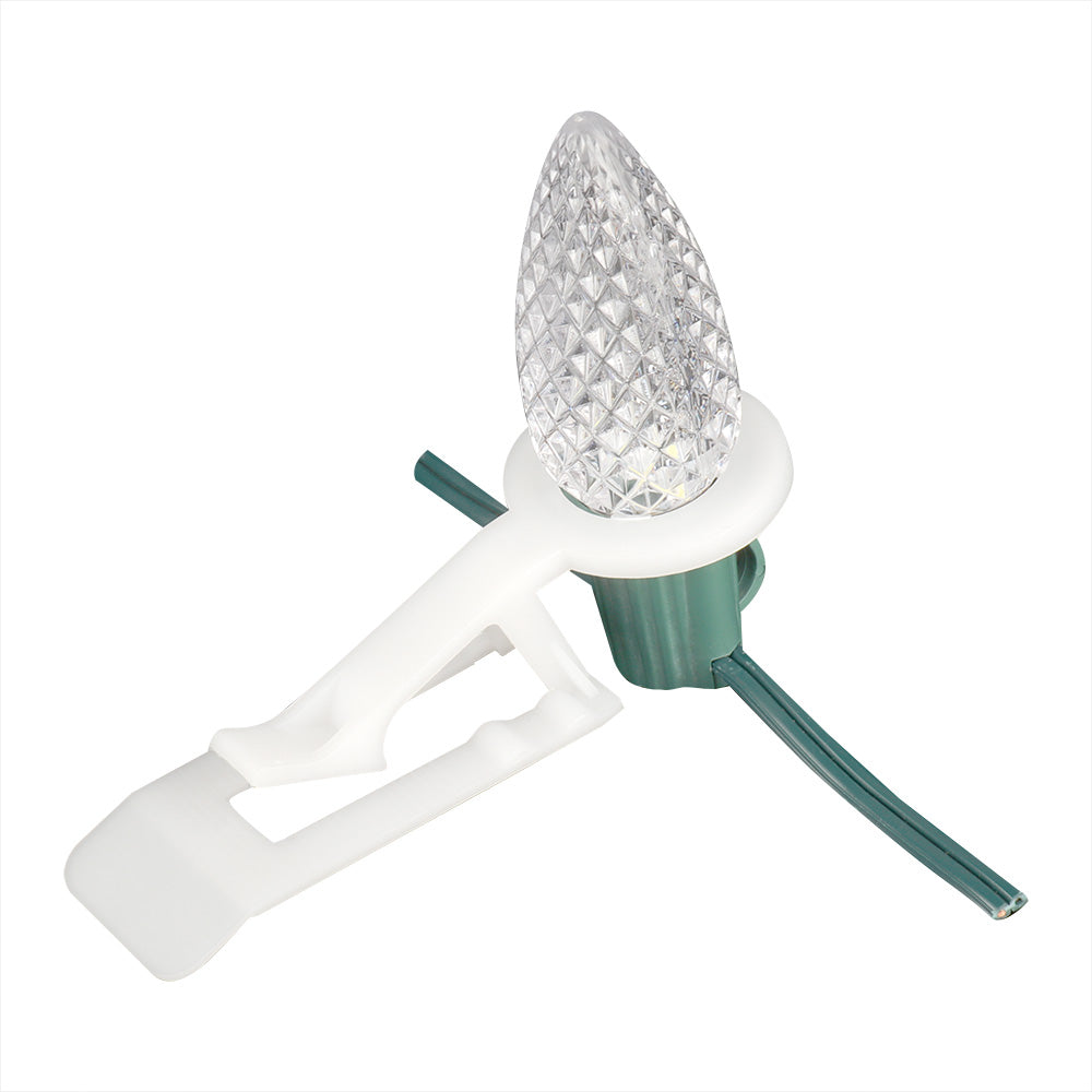 Tuff Clip C9 Wedge Clip attached to a C9 bulb with right-facing orientation for holiday lighting installation applications.