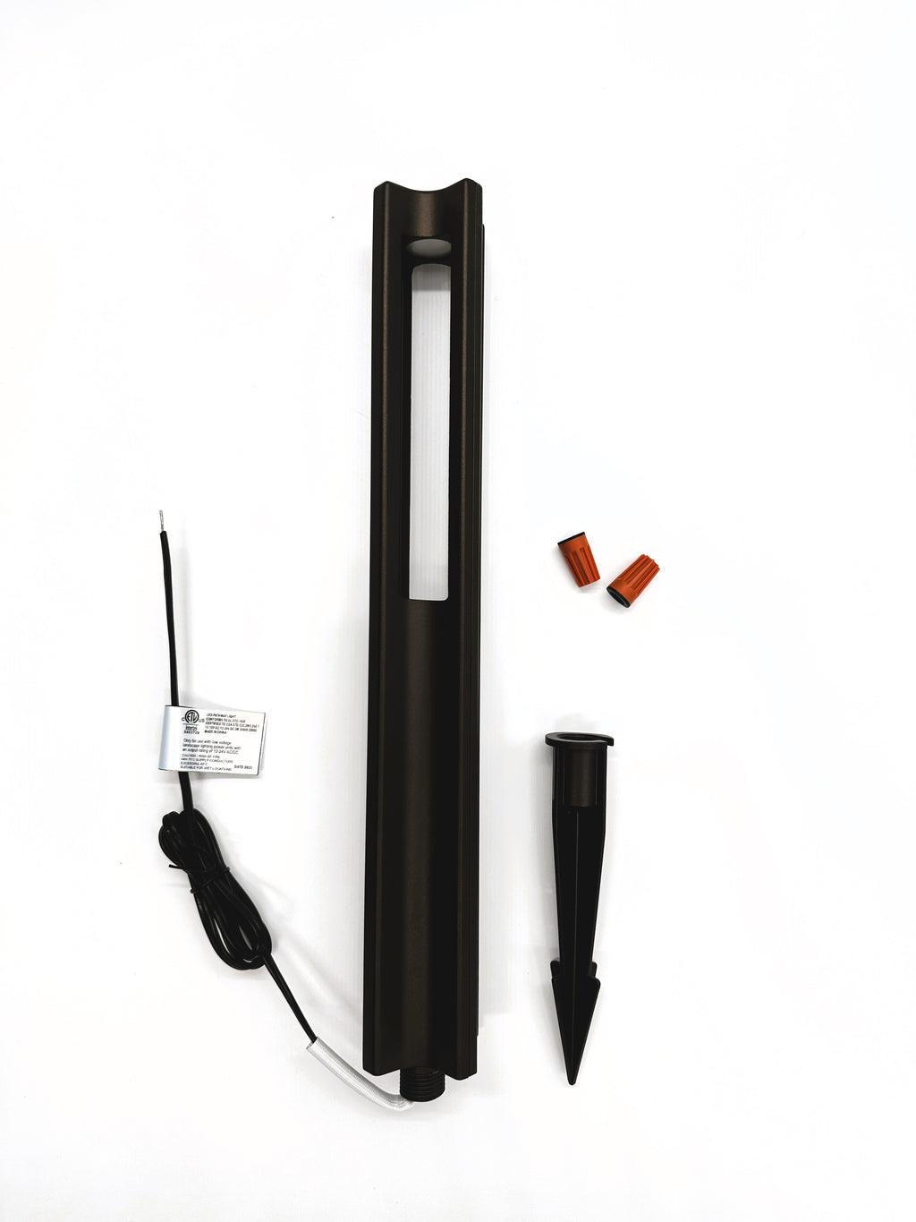 Low voltage modern pathlight with clean geometric lines, illuminating an outdoor pathway with efficient 3W LED landscape lighting.