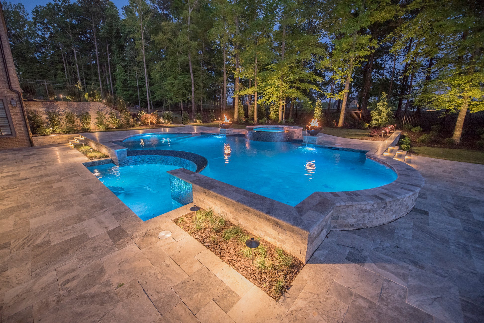Custom pool and backyard landscape lighting sold to contractors by Adino Lighting in Atlanta, Georgia